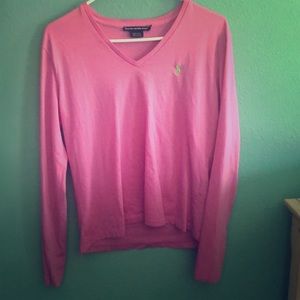 A pink polo shirt